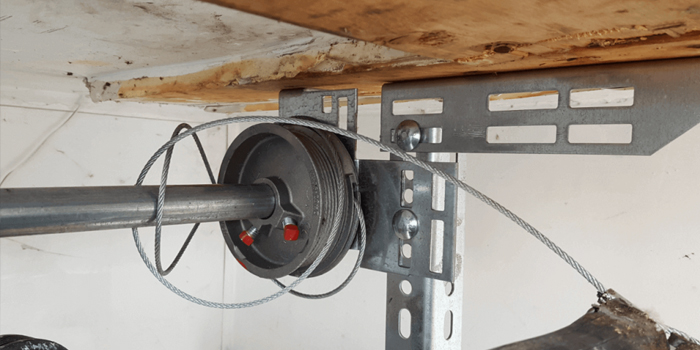 Scarborough Village fix garage door cable